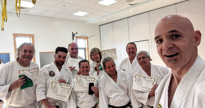 Dojo students pose for selfie after successful testing