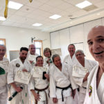 Dojo students pose for selfie after successful testing
